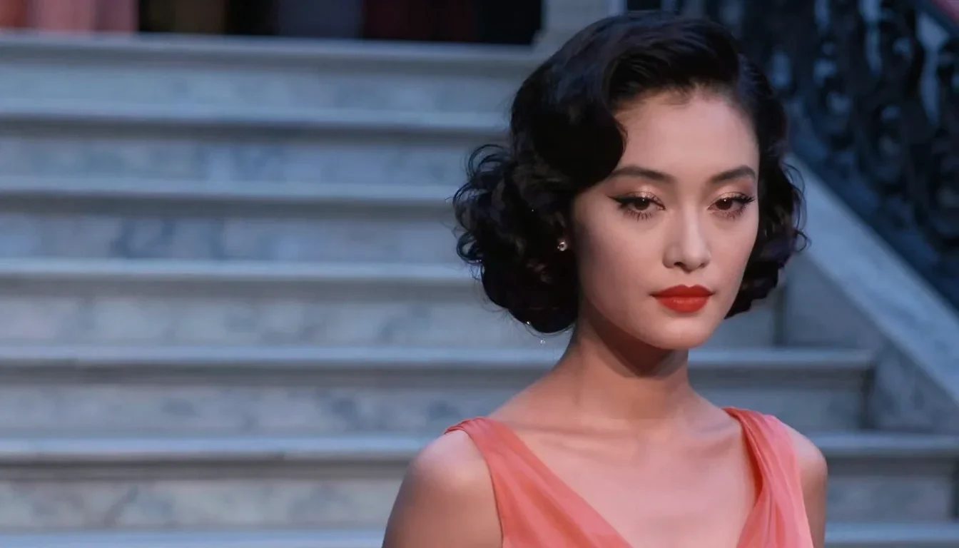 a couture catwalk muse with razor cheekbones in a coy glance from under lowered lashes, on a marble staircase at dawn, W